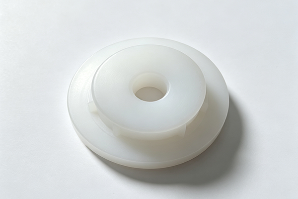 Custom CNC machined white POM stepped plastic bushing components